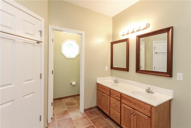 7876 Oscar Green Road Primm Springs, TN 38476 - Photo 15 of 20 Master bath features double vanity and enclosed toilet room