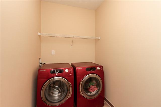 7876 Oscar Green Road Primm Springs, TN 38476 - Photo 19 of 20 Utility room with tiled floor
