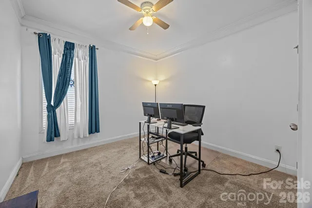 a view of hallway with wooden floor