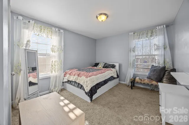 a bathroom with a sink double vanity and a mirror