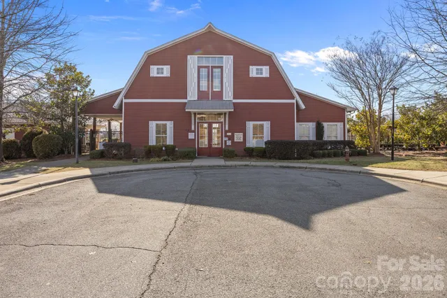 a view of a backyard with sitting area