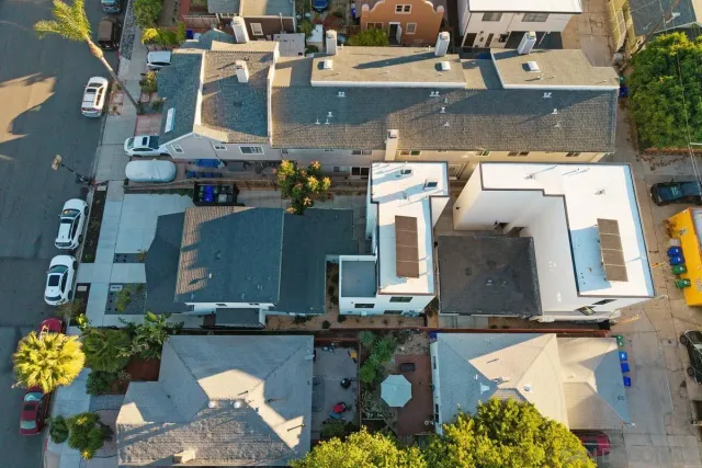an aerial view of a house with swimming pool