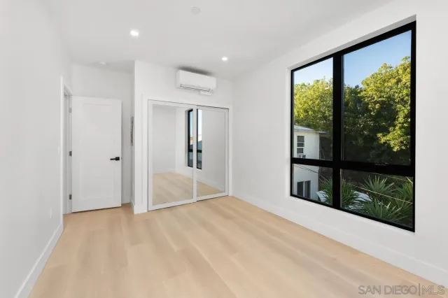 a view of an empty room and window