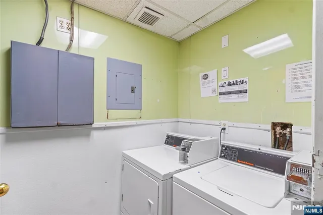 a bathroom with a sink and cabinets