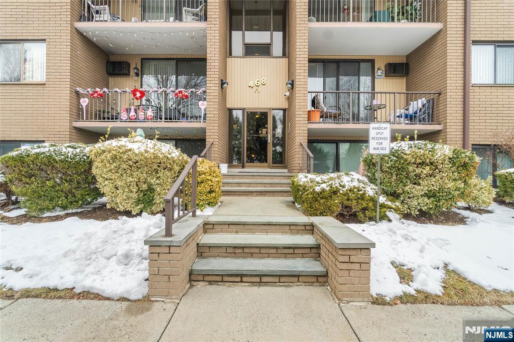 468 A Liberty Street, Unit 101 Little Ferry, NJ 07643 - Photo 3 of 22 a front view of a house with outdoor seating
