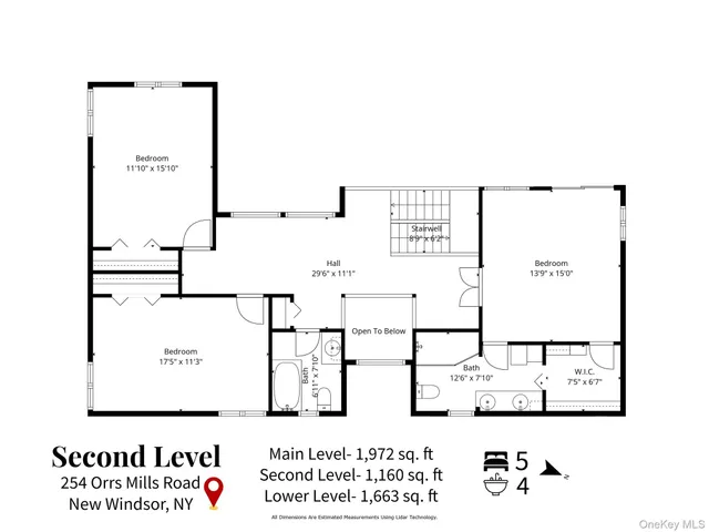 a view of a patio with table and chairs with wooden fence
