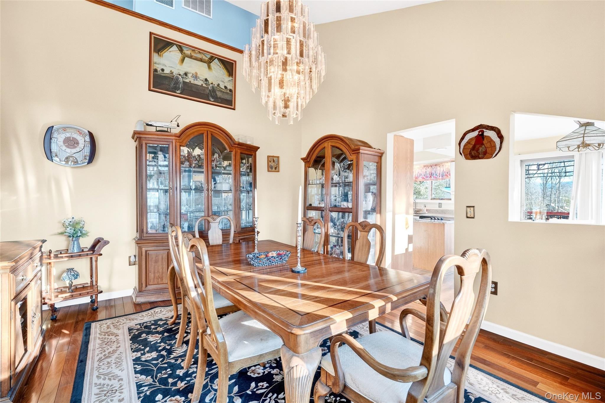 254 Orrs Mills Road Cornwall, NY 12553 - Photo 15 of 50 a dining room with furniture a rug and wooden floor