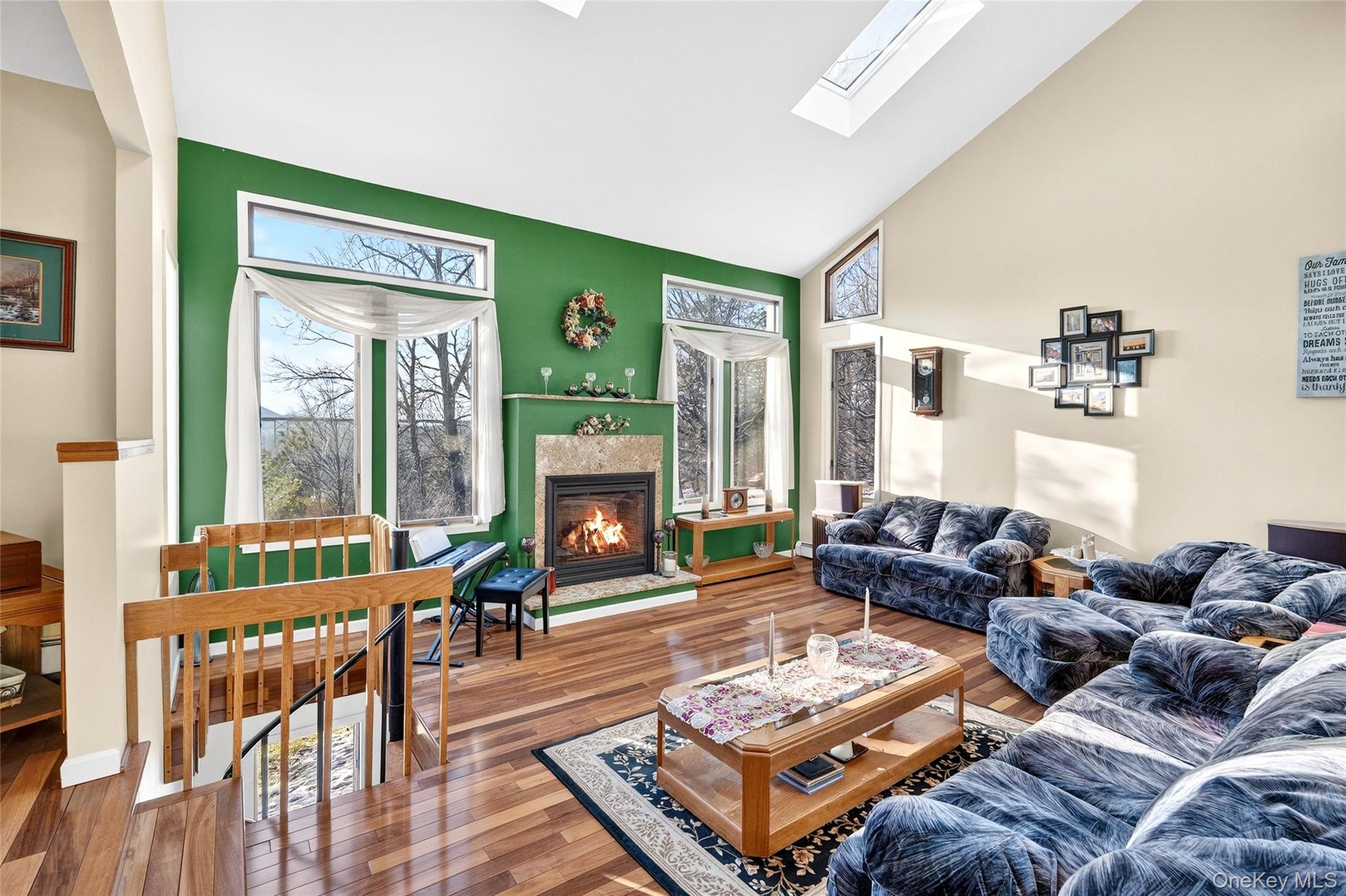 254 Orrs Mills Road Cornwall, NY 12553 - Photo 2 of 50 a living room with furniture and a fireplace