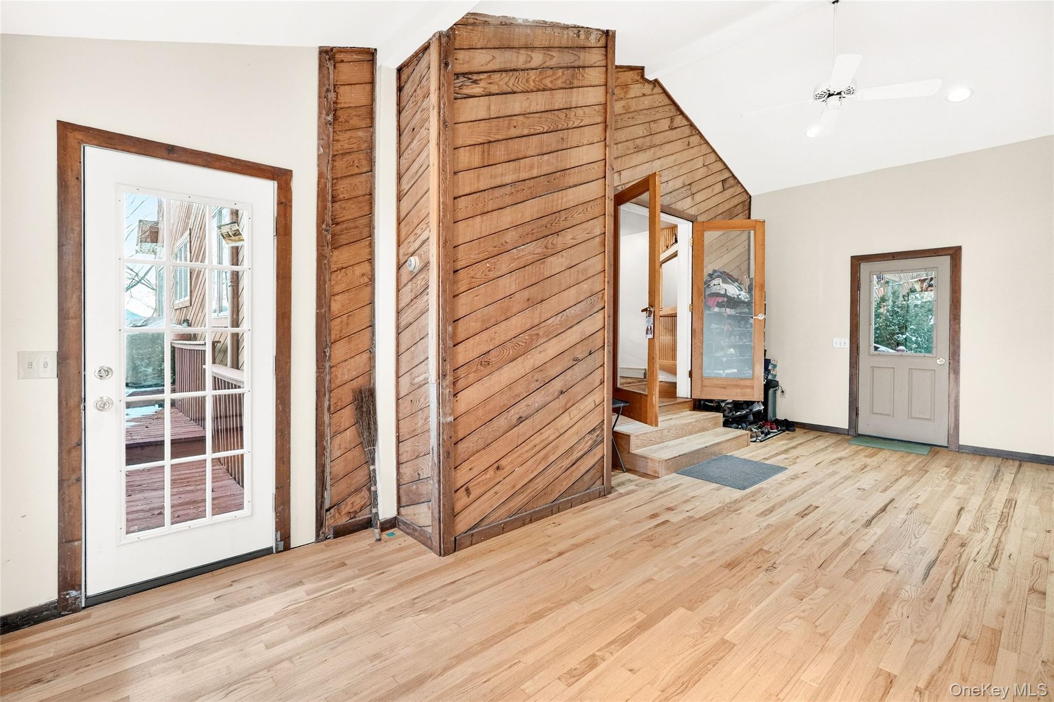 254 Orrs Mills Road Cornwall, NY 12553 - Photo 20 of 50 an empty room with wooden floor and windows