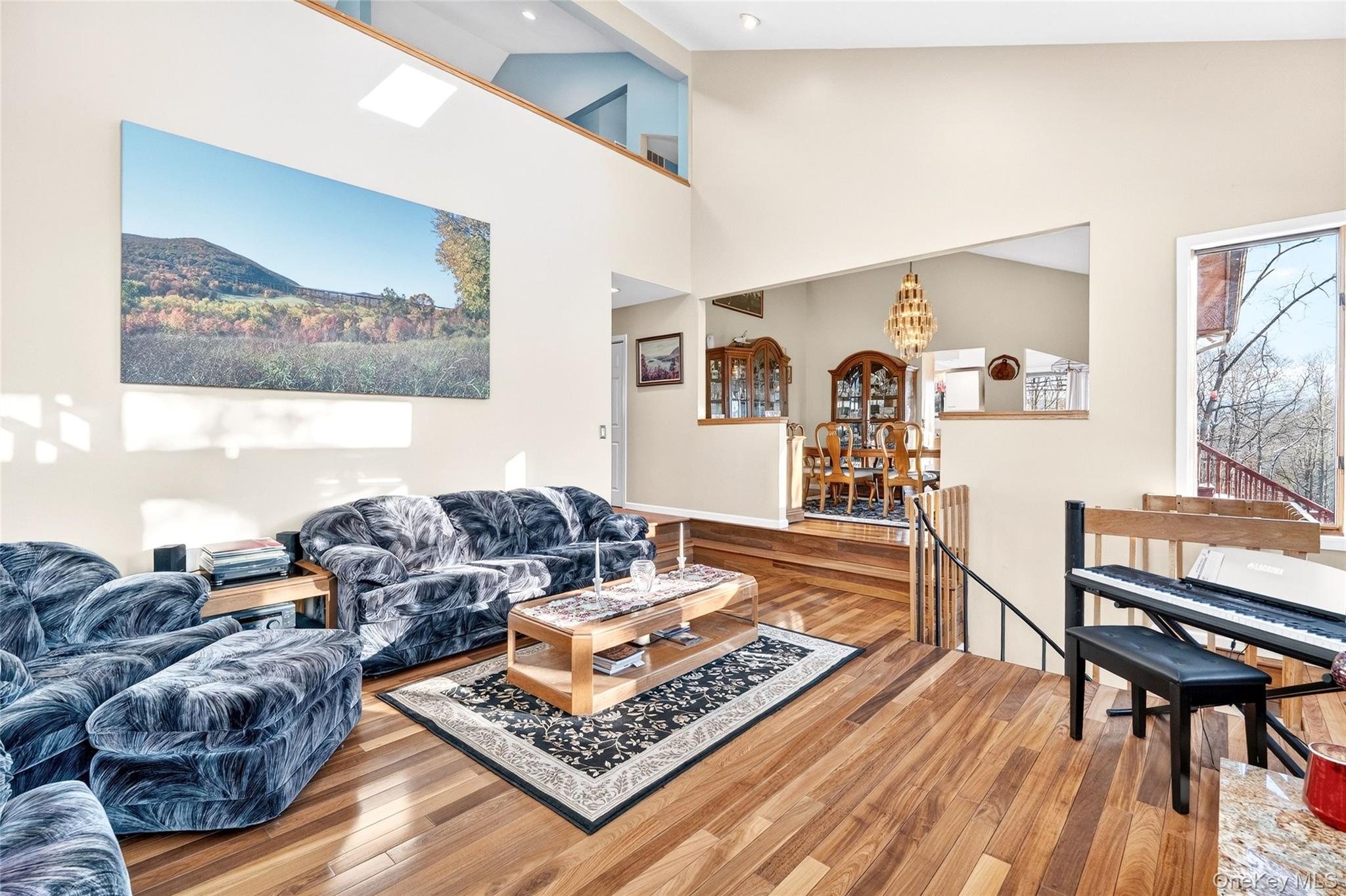 254 Orrs Mills Road Cornwall, NY 12553 - Photo 4 of 50 a living room with furniture and a wooden floor