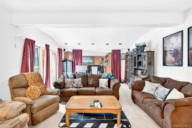 a view of a kitchen with wooden floor and a kitchen
