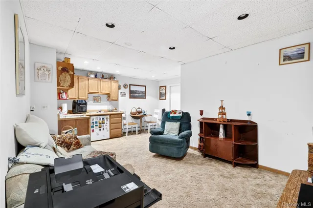 a bedroom with bed and window