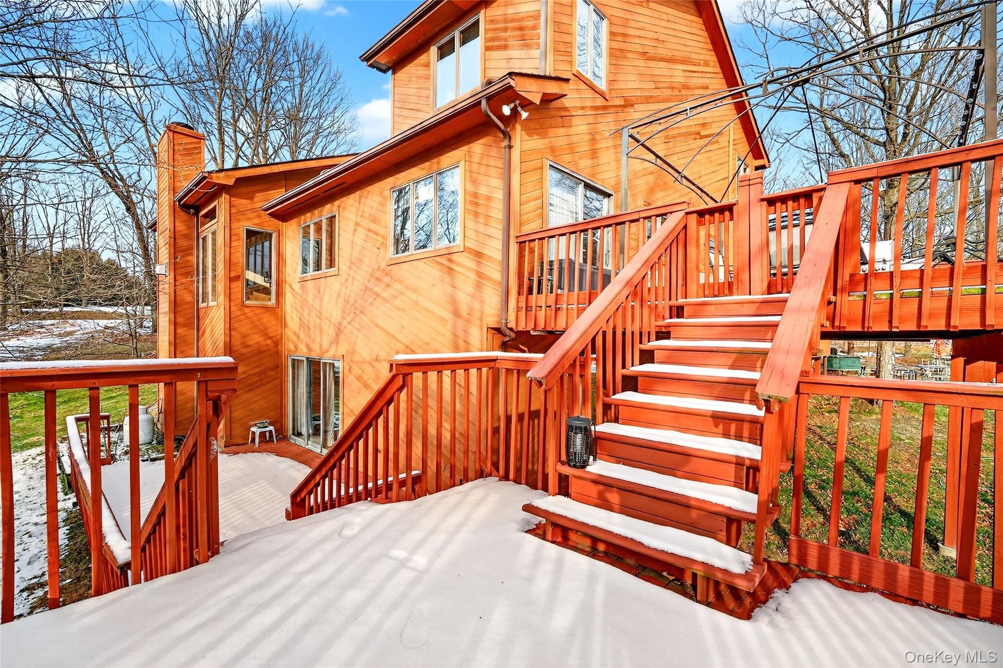 254 Orrs Mills Road Cornwall, NY 12553 - Photo 44 of 50 a view of a house with wooden stairs