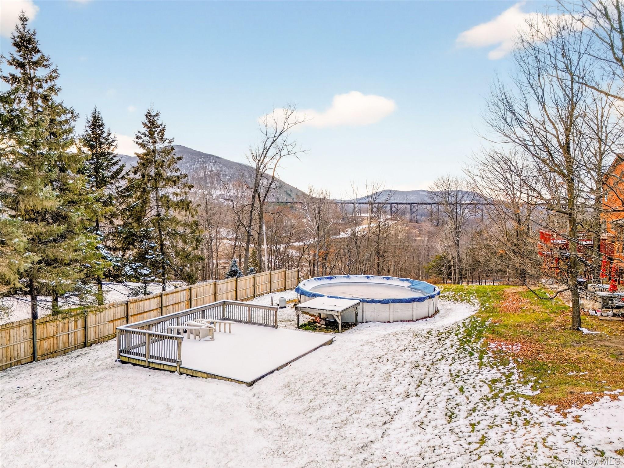 254 Orrs Mills Road Cornwall, NY 12553 - Photo 46 of 50 a park view with a bench and trees