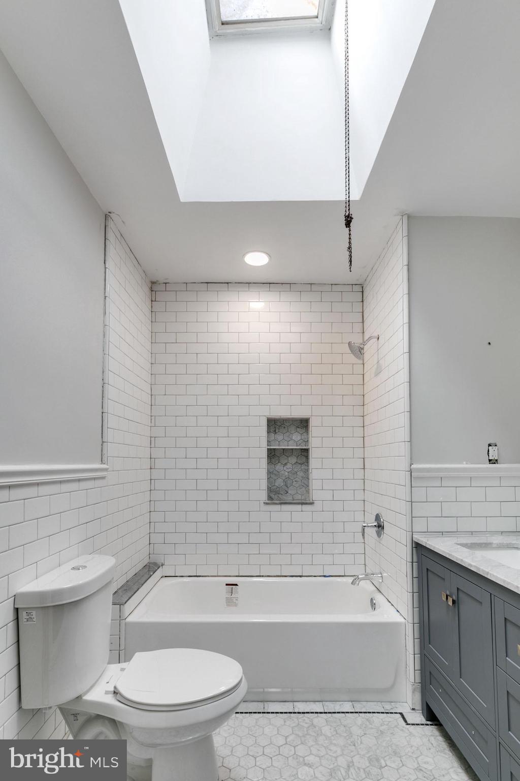 5743 Virginian Road Philadelphia, PA 19141 - Photo 19 of 27 Original skylight, renovated space.