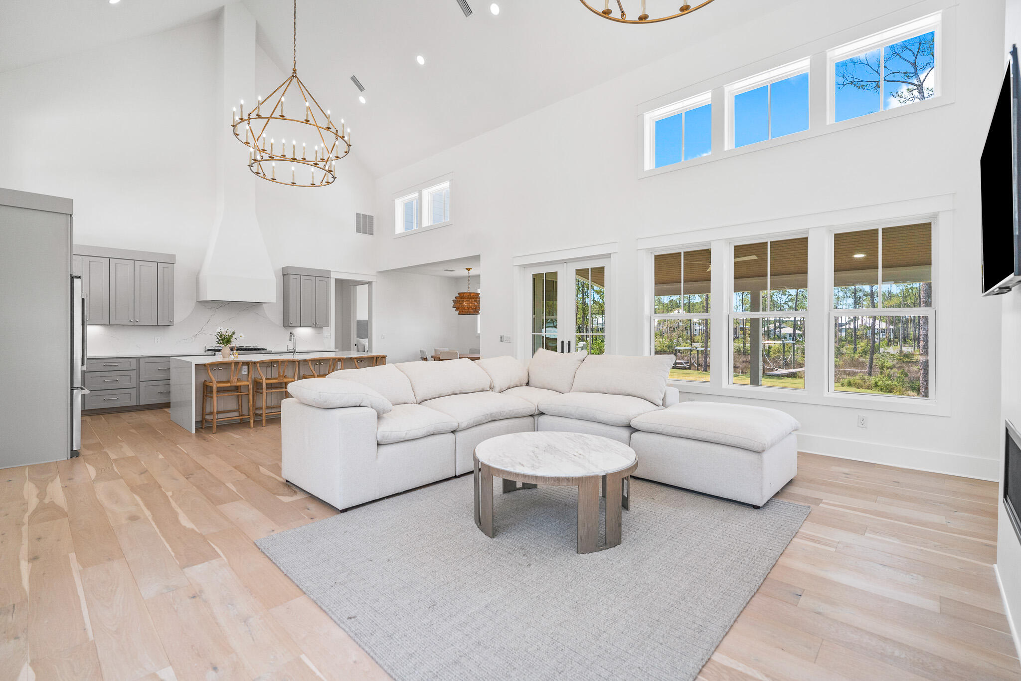 121 West Nursery Road Santa Rosa Beach, FL 32459 - Photo 18 of 66 a living room with furniture and a large window