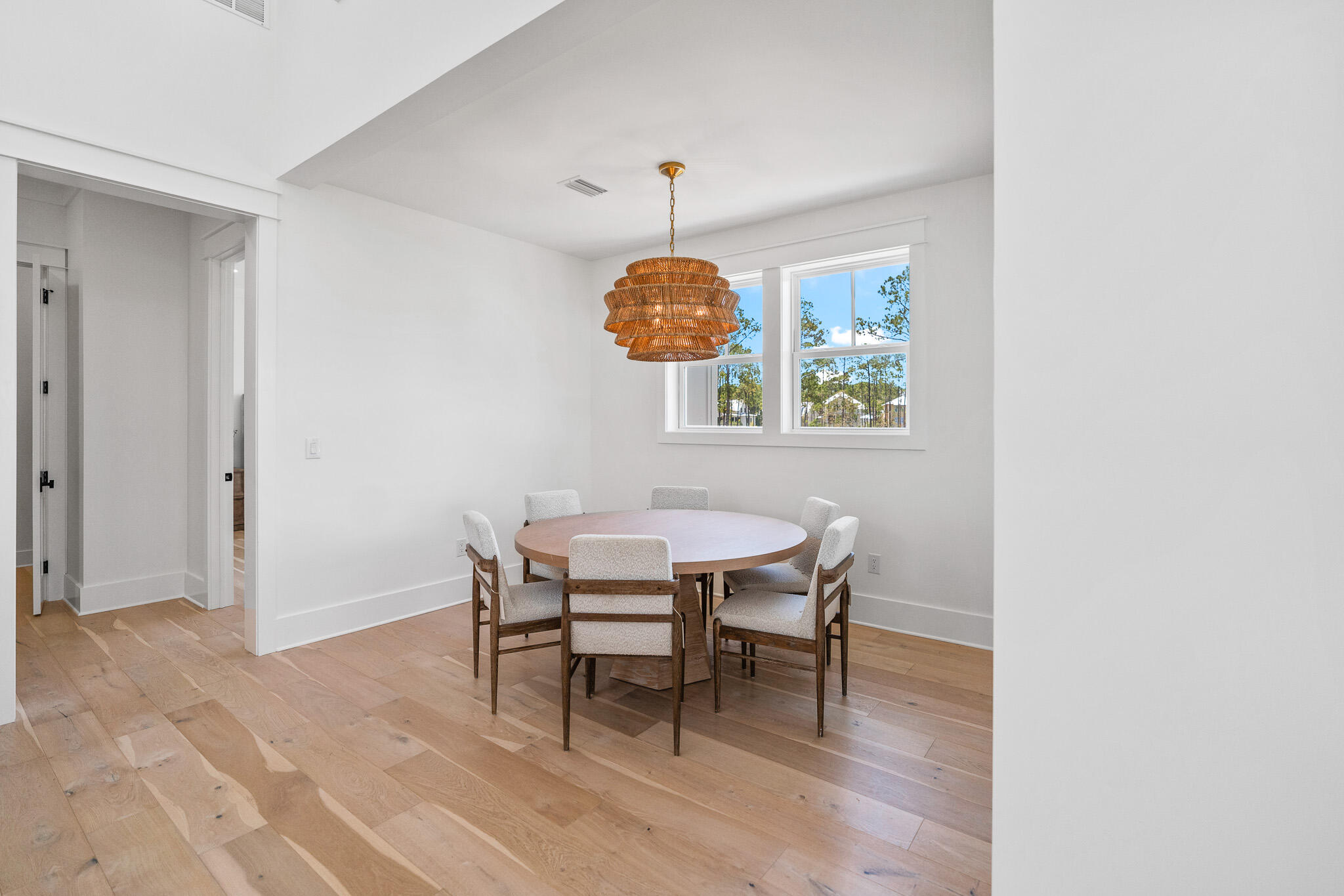 121 West Nursery Road Santa Rosa Beach, FL 32459 - Photo 31 of 66 a dining room with furniture and window