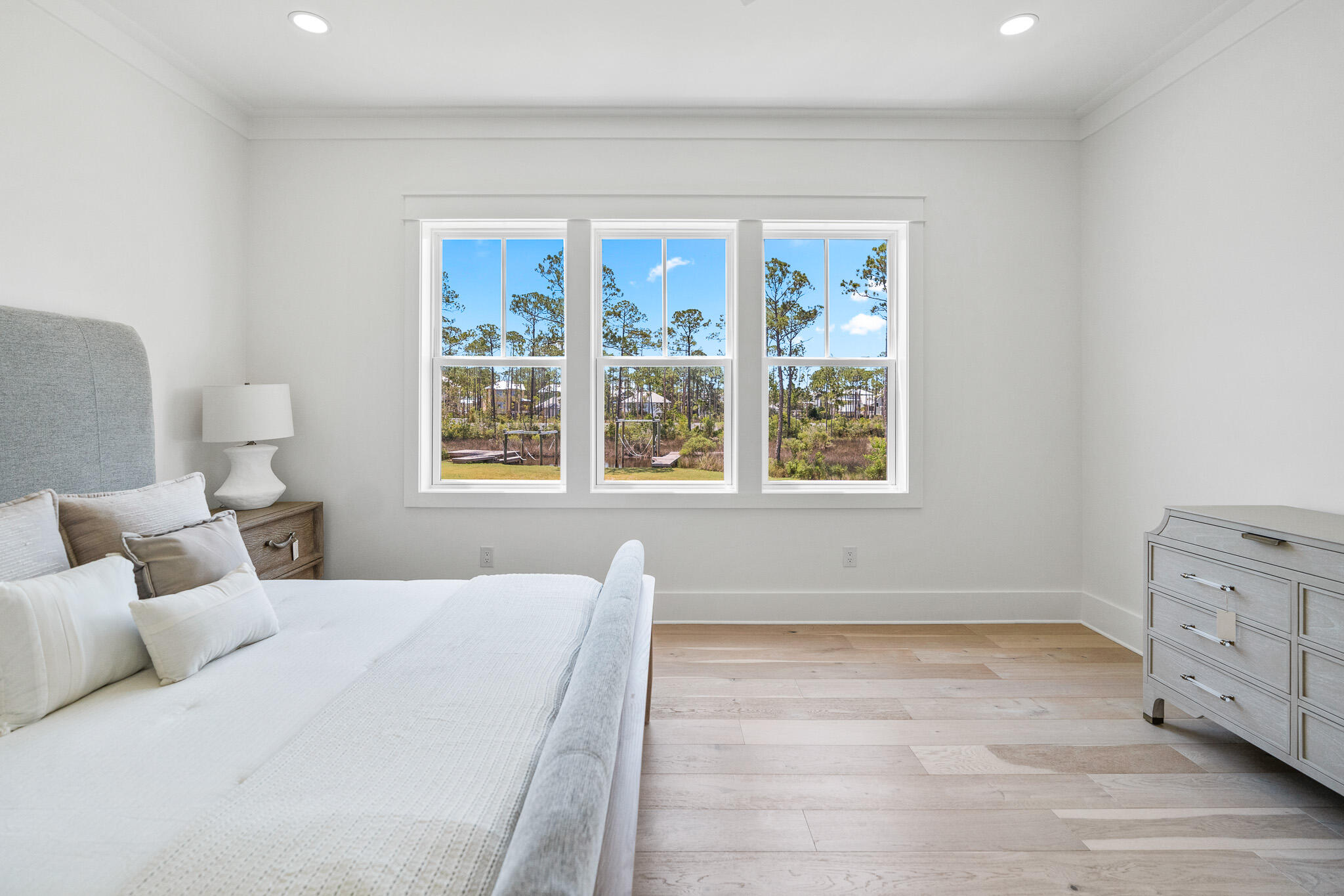 121 West Nursery Road Santa Rosa Beach, FL 32459 - Photo 38 of 66 a bedroom with a bed and a window