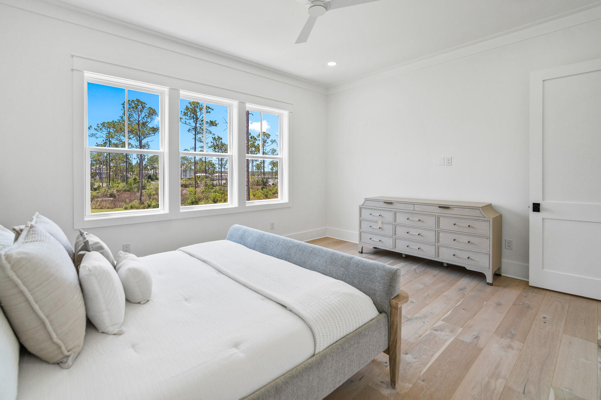 121 West Nursery Road Santa Rosa Beach, FL 32459 - Photo 39 of 66 a bedroom with a bed and a window