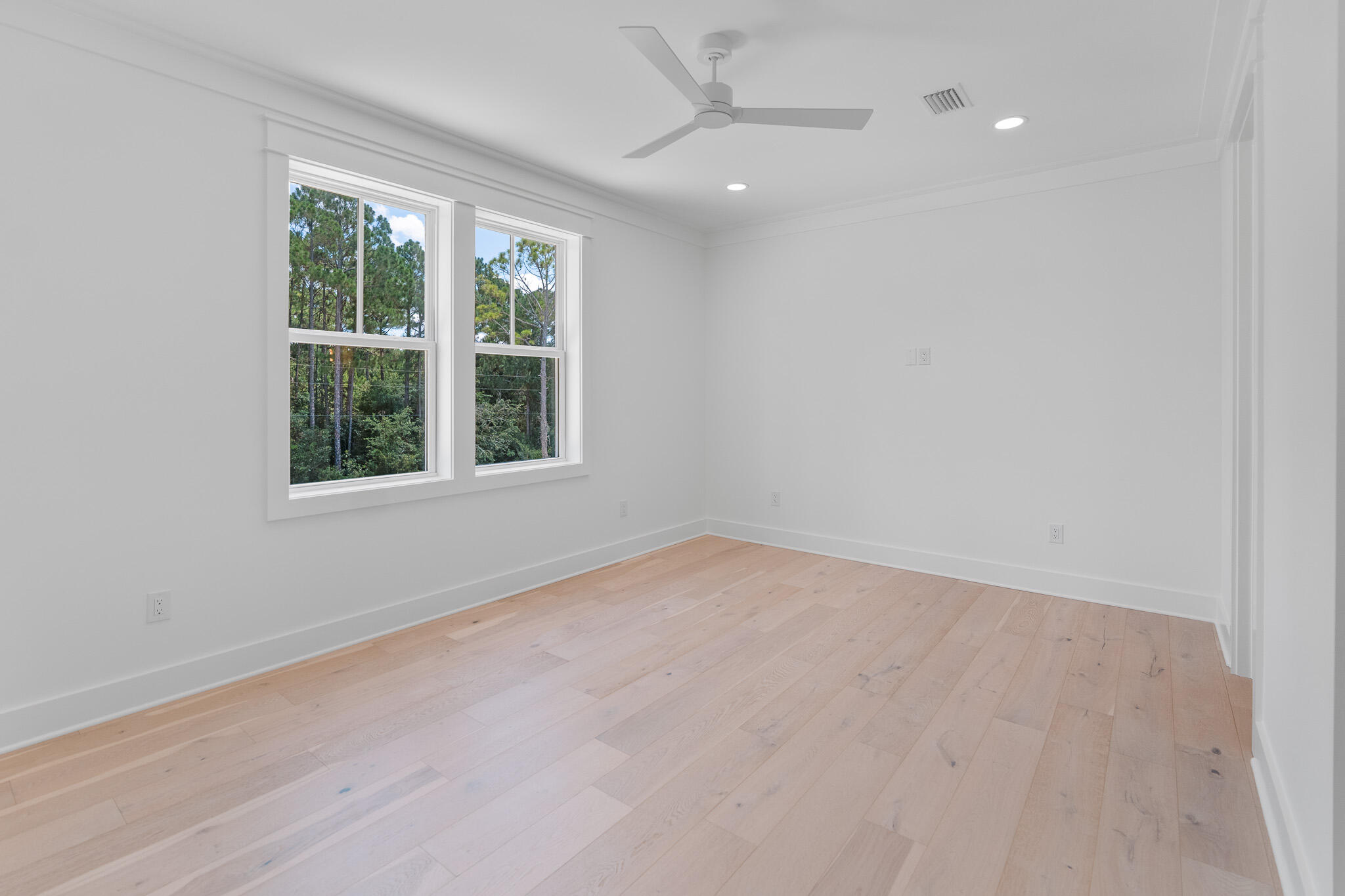 121 West Nursery Road Santa Rosa Beach, FL 32459 - Photo 47 of 66 an empty room with a window
