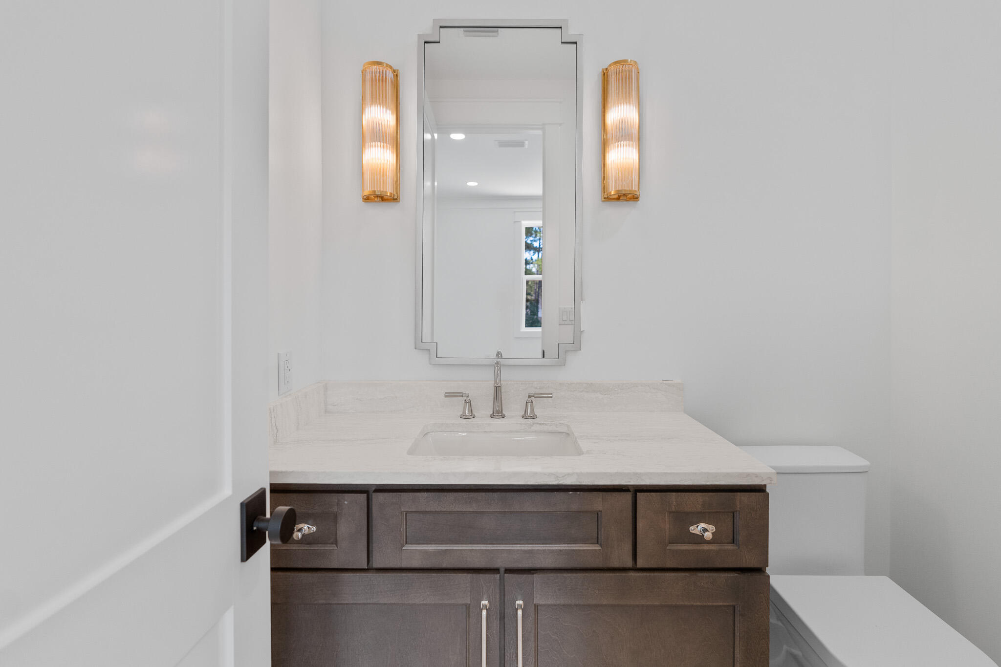 121 West Nursery Road Santa Rosa Beach, FL 32459 - Photo 48 of 66 a bathroom with a sink and a mirror