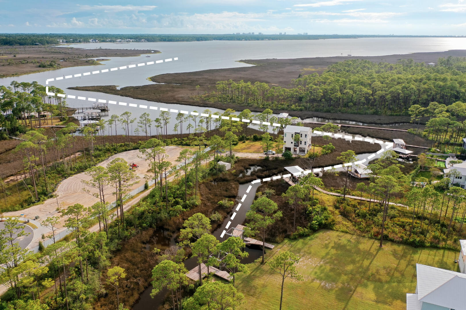 121 West Nursery Road Santa Rosa Beach, FL 32459 - Photo 8 of 66 a view of a lake with a nearby beach