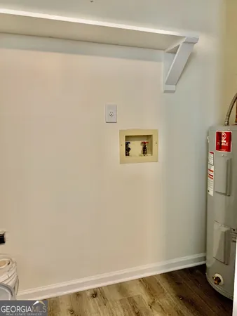 a view of small space with racks on the wall