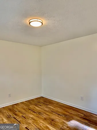 a view of a room with an empty space