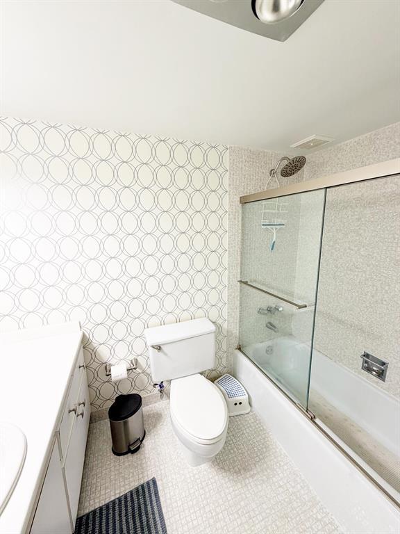 2681 South Course Drive, Unit 511 Pompano Beach, FL 33069 - Photo 14 of 35 a bathroom with a toilet and a shower