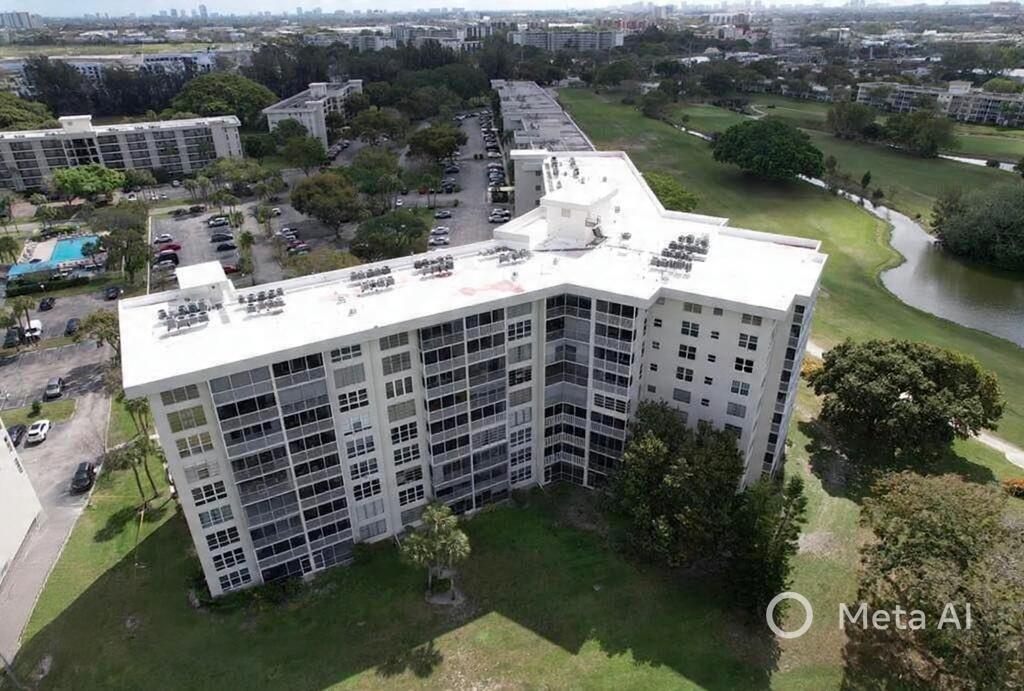 2681 South Course Drive, Unit 511 Pompano Beach, FL 33069 - Photo 31 of 35 a view of a backyard