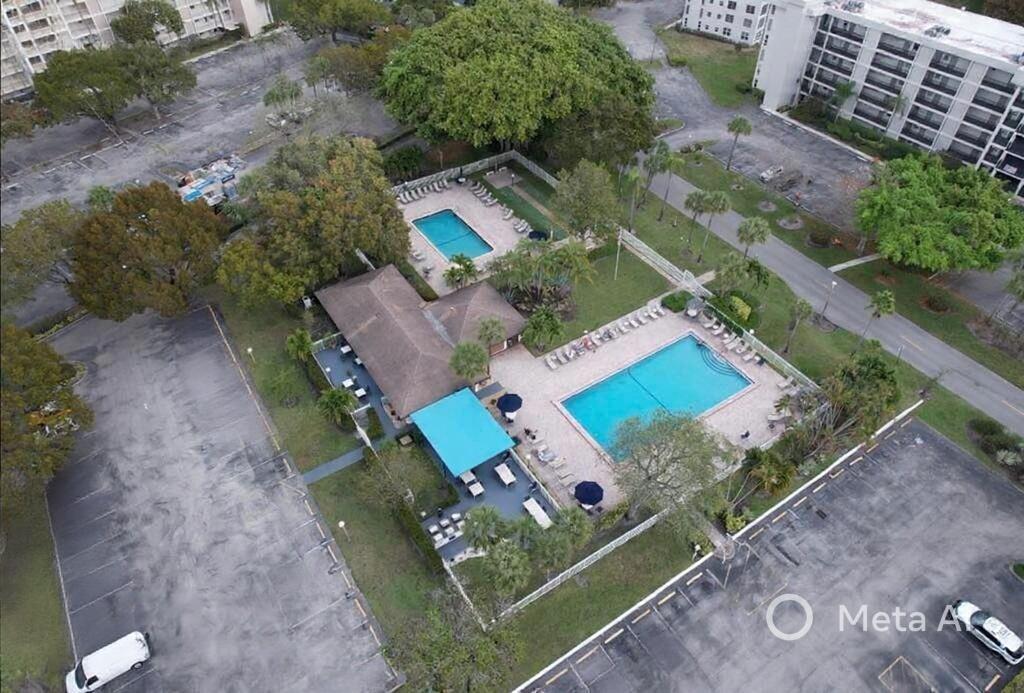 2681 South Course Drive, Unit 511 Pompano Beach, FL 33069 - Photo 32 of 35 an aerial view of a house
