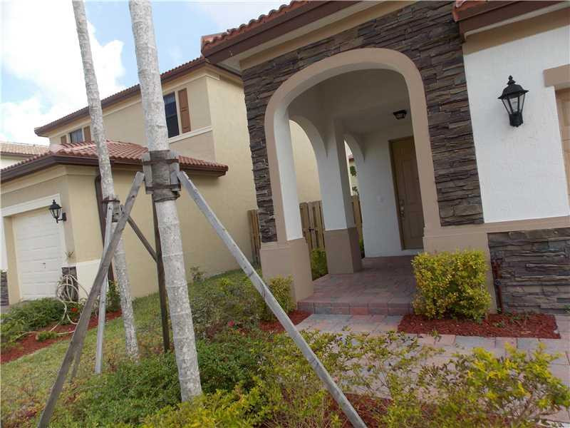 9116 Southwest 227th Terrace Miami, FL 33190 - Photo 3 of 35 Exterior Front