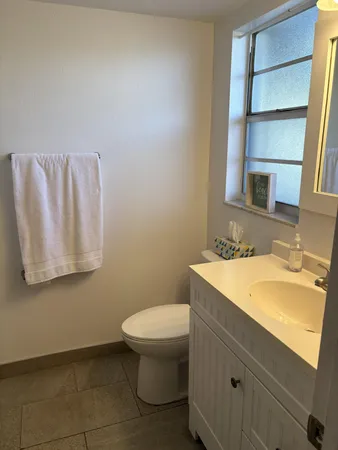 a bathroom with a sink and a toilet