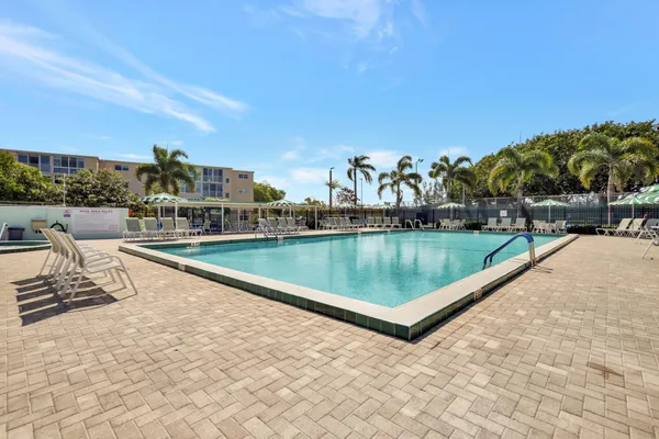 swimming pool view with a outdoor space