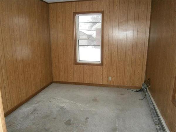 79 Parker Street Springfield, MA 01151 - Photo 8 of 9 an empty room with windows