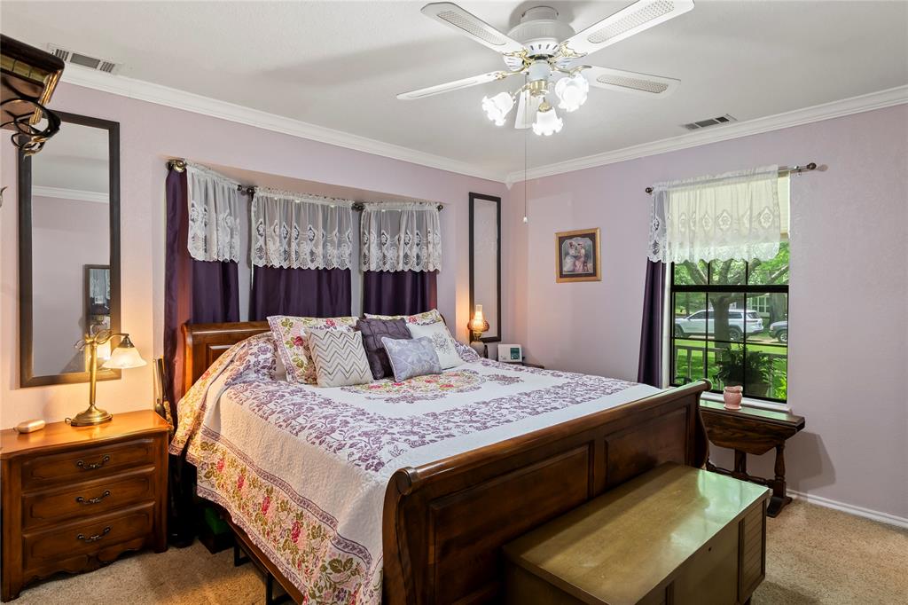 455 Stirrup Ranch Road Trinidad, TX 75163 - Photo 12 of 20 a bedroom with a bed and a window