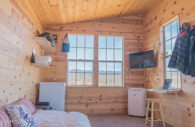 a view of a house with a snow on the road