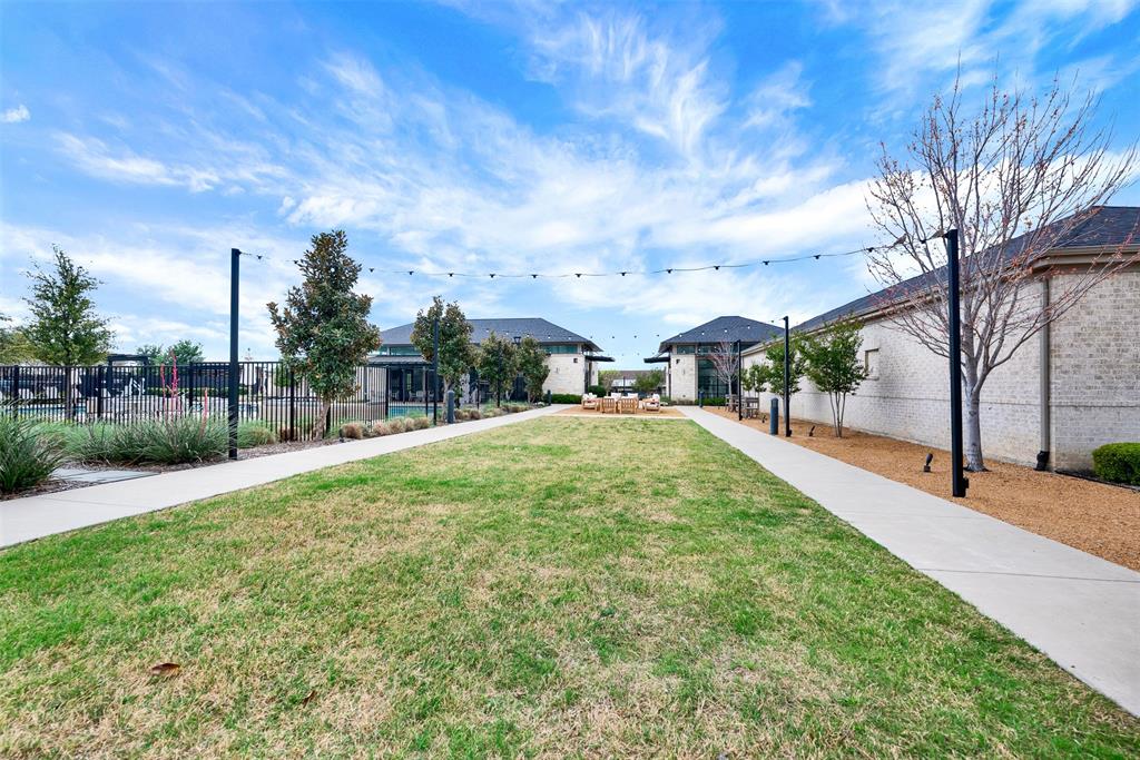 651 Watters Road, Unit 7406 Allen, TX 75013 - Photo 10 of 37 Community amenity complex with a pool, putting green, fire pit, fitness center, and clubhouse