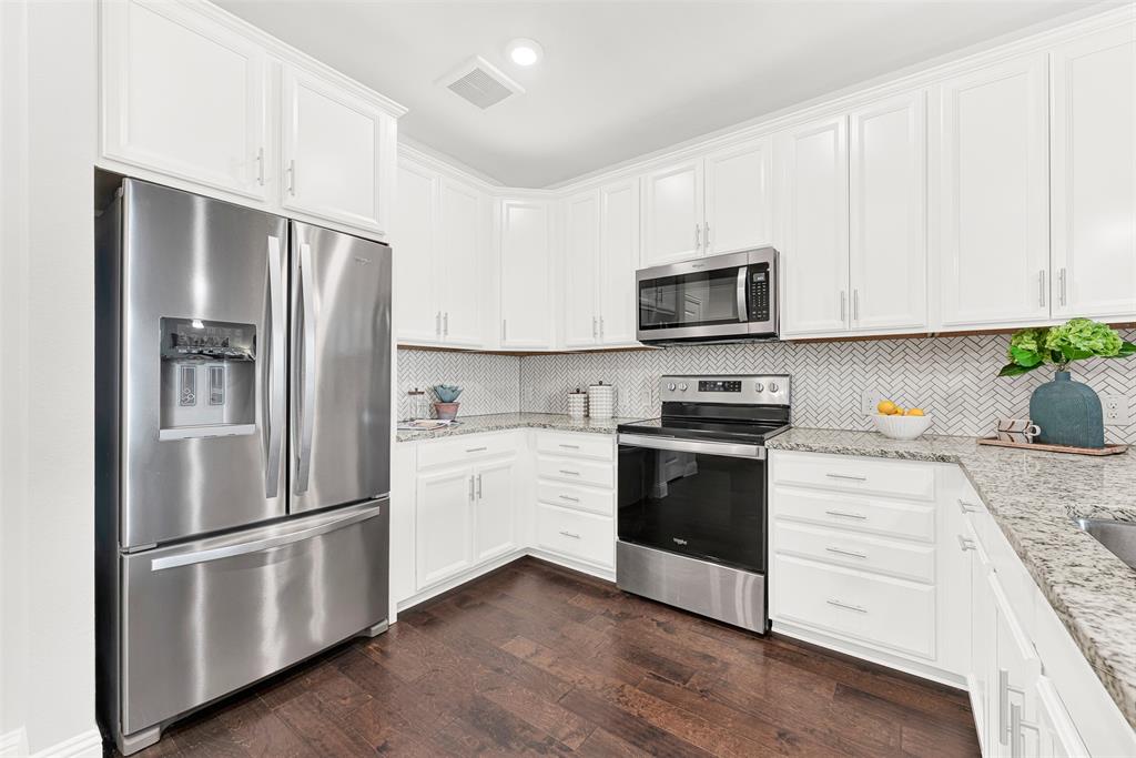 651 Watters Road, Unit 7406 Allen, TX 75013 - Photo 16 of 37 Stainless steel appliances in your modern kitchen