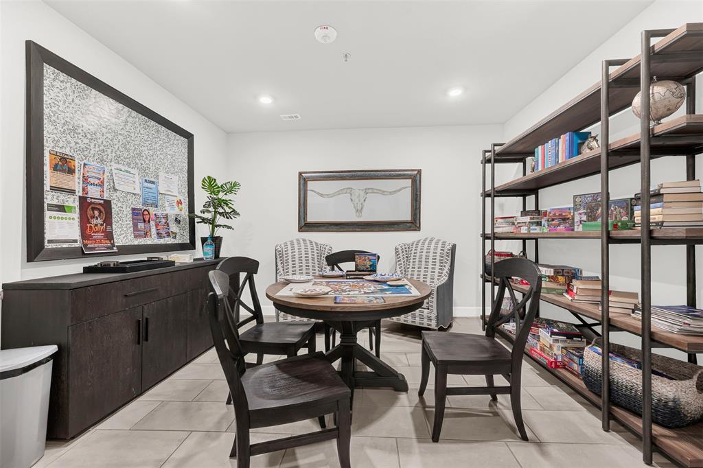 651 Watters Road, Unit 7406 Allen, TX 75013 - Photo 36 of 37 Extra game room for building G owners with games, puzzles, and books