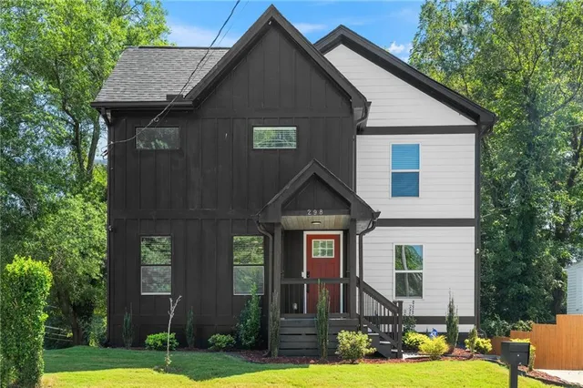 a front view of a house with yard
