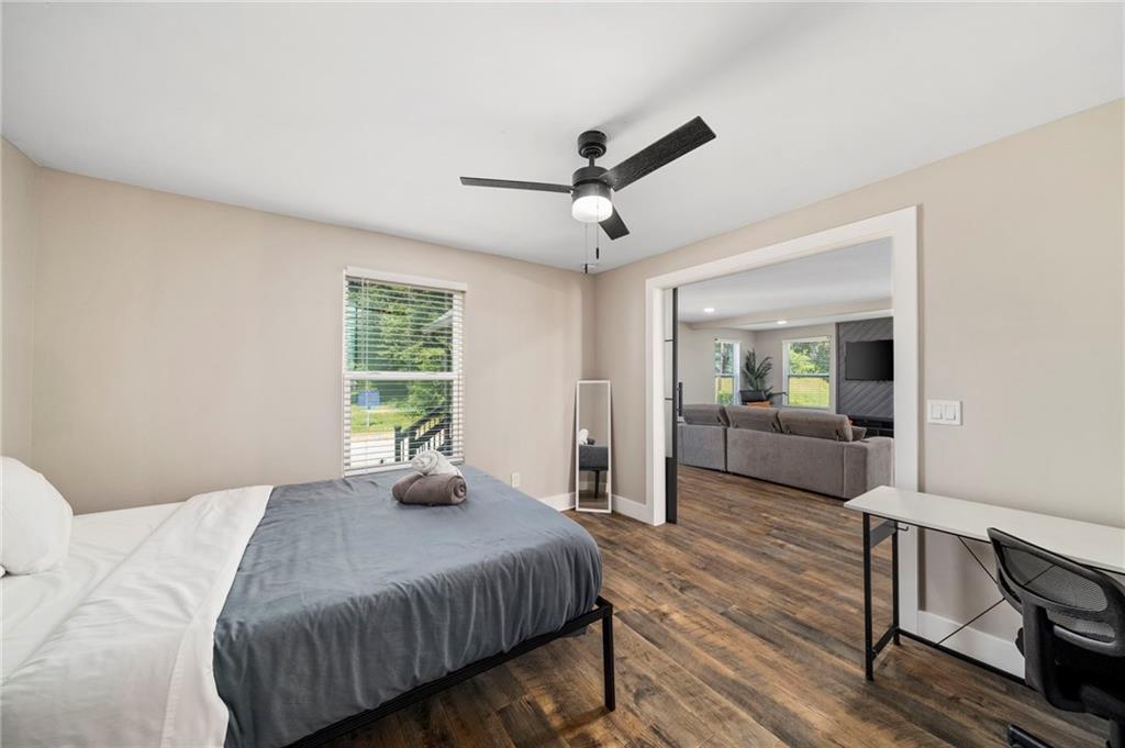 298 Roy Street Southwest Atlanta, GA 30310 - Photo 21 of 50 a bedroom with a bed and a window