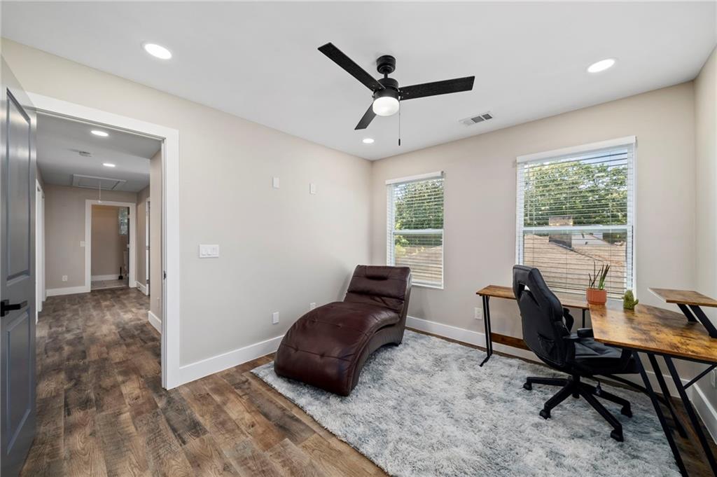 298 Roy Street Southwest Atlanta, GA 30310 - Photo 28 of 50 a view of a workspace with furniture and a window