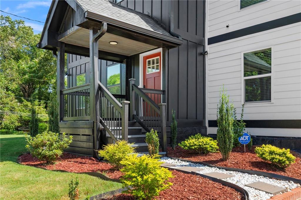 298 Roy Street Southwest Atlanta, GA 30310 - Photo 3 of 50 a front view of a house having yard