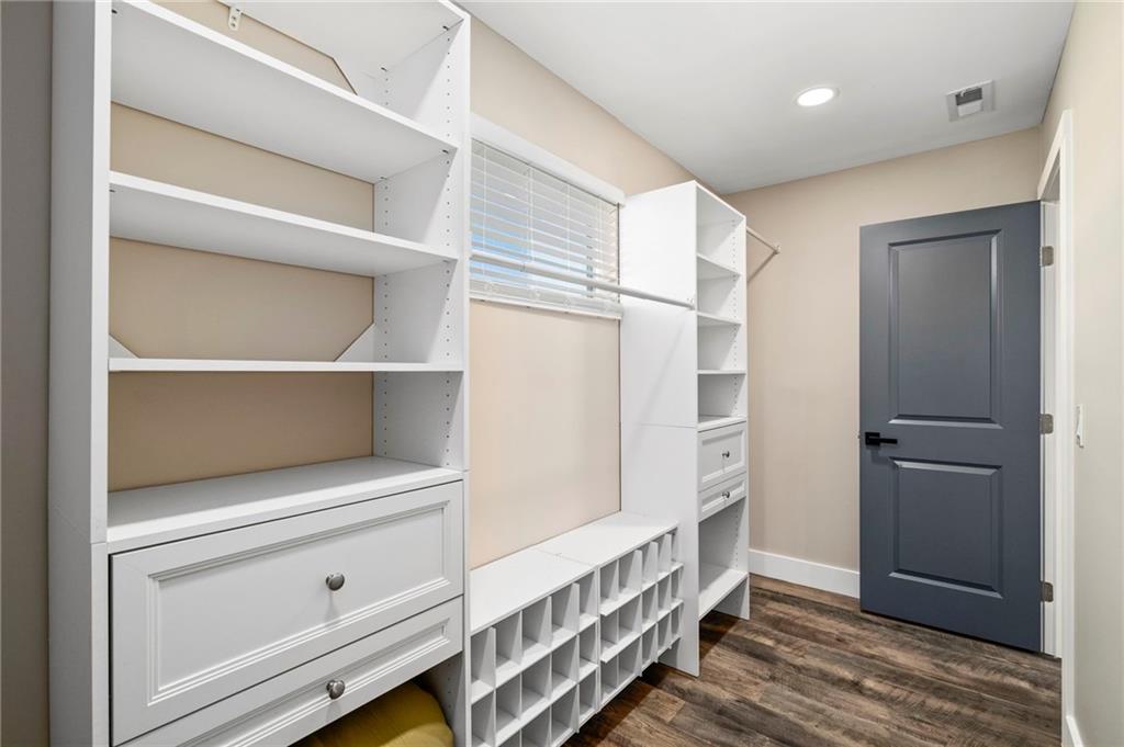 298 Roy Street Southwest Atlanta, GA 30310 - Photo 33 of 50 a view of hallway with stairs and wooden floor
