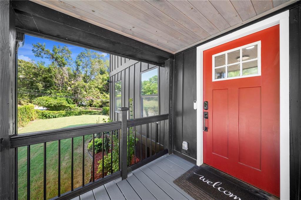 298 Roy Street Southwest Atlanta, GA 30310 - Photo 4 of 50 a view of balcony with wooden floor
