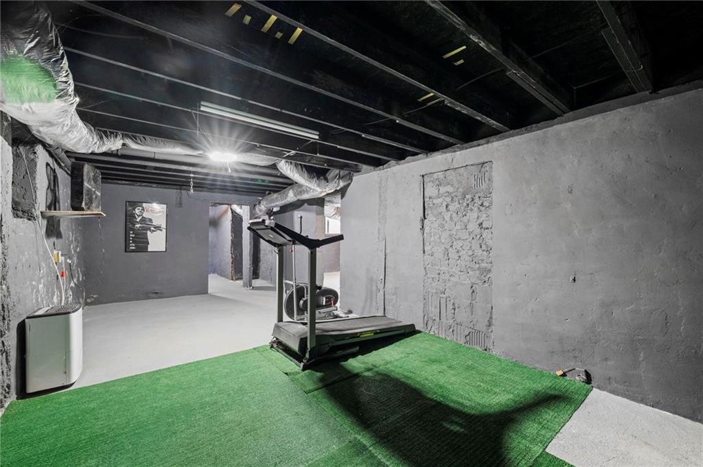 298 Roy Street Southwest Atlanta, GA 30310 - Photo 41 of 50 a view of a room with gym equipment