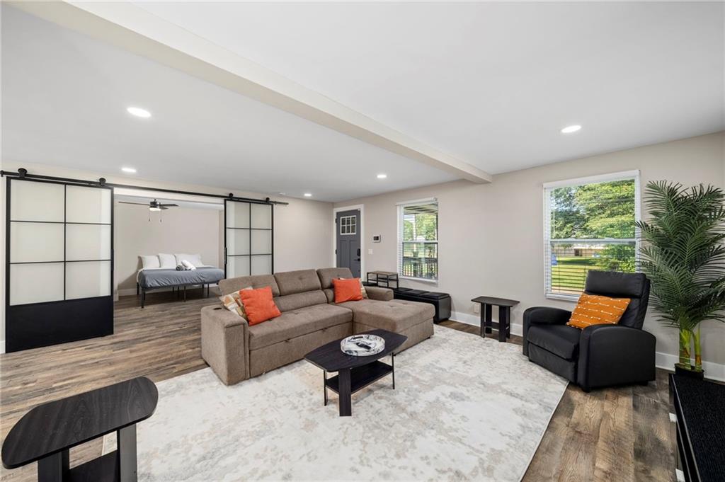 298 Roy Street Southwest Atlanta, GA 30310 - Photo 8 of 50 a living room with furniture and a large window