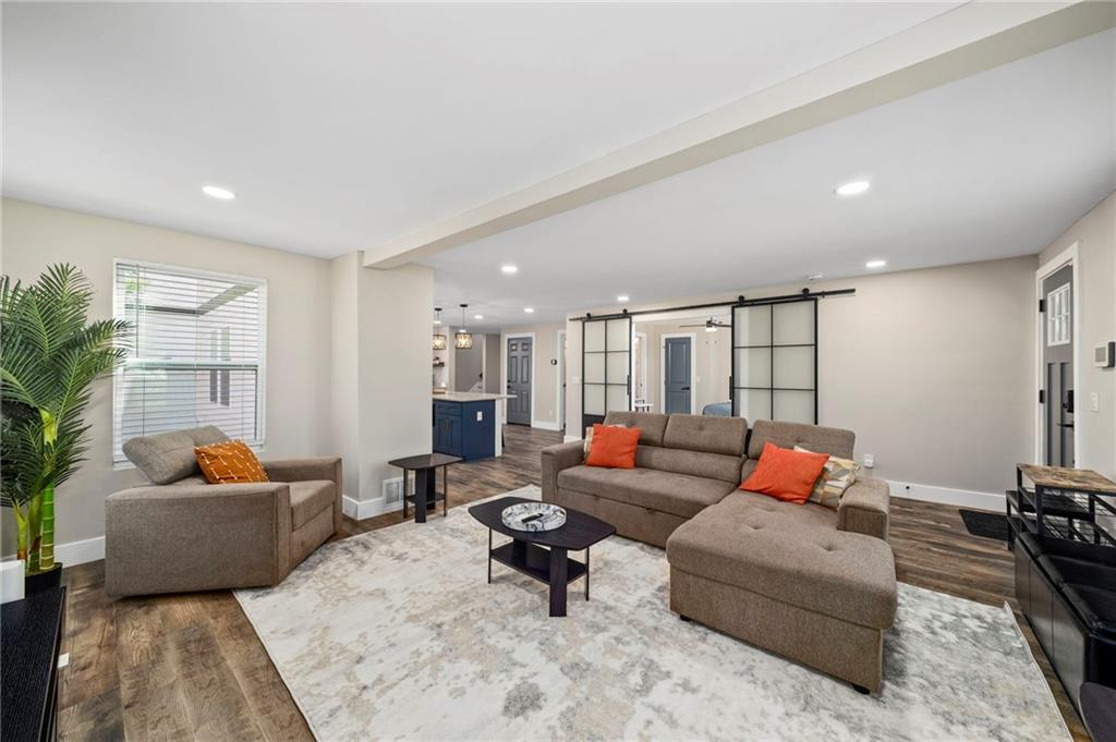 298 Roy Street Southwest Atlanta, GA 30310 - Photo 9 of 50 a living room with furniture and a couch