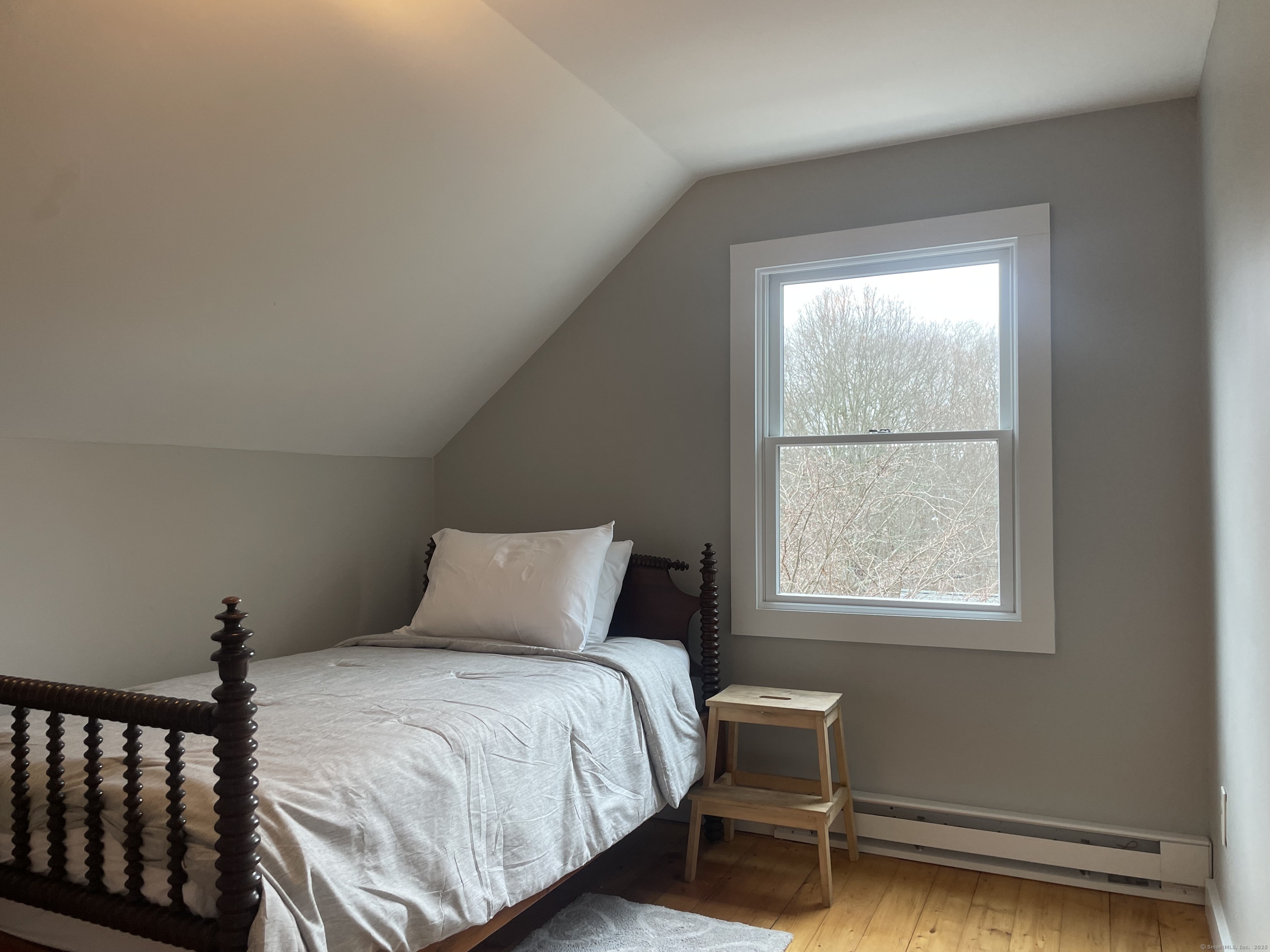 12 Little Gull Lane Groton, CT 06355 - Photo 14 of 25 a bedroom with a bed and a window